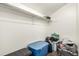Walk-in closet space with storage containers and organization solutions for optimal convenience at 11105 E Alameda Ave # 204, Aurora, CO 80012