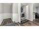 Well-lit laundry room features a modern washer and dryer unit tucked behind folding doors at 11105 E Alameda Ave # 204, Aurora, CO 80012