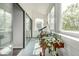 Bright sunroom filled with plants and natural light, perfect for relaxing or enjoying hobbies at 11105 E Alameda Ave # 204, Aurora, CO 80012