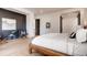 Bedroom featuring modern furnishings, a bed, and hardwood floors at 2435 S Josephine St, Denver, CO 80210