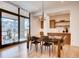 Well-lit dining area with large windows and views of the outdoors at 2435 S Josephine St, Denver, CO 80210