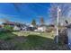 Large backyard showcasing a shed, grassy area, garden plot, and parking at 2819 W 43Rd Ave, Denver, CO 80211