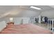 Bright bedroom with slanted ceilings, closet space, natural light, and modern decor at 2819 W 43Rd Ave, Denver, CO 80211