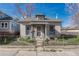 Charming single-story house with a classic design, fenced yard and mature trees at 2819 W 43Rd Ave, Denver, CO 80211