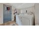 Efficient laundry room featuring a full size washer and dryer, and easy access to the outdoors at 2819 W 43Rd Ave, Denver, CO 80211