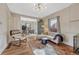 Inviting living room showcasing an open floor plan with stylish decor and hardwood floors at 2819 W 43Rd Ave, Denver, CO 80211