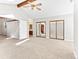 The primary bedroom offers convenient access to a full bathroom and a mirrored walk-in closet at 11181 Main Range Trl, Littleton, CO 80127