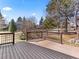 Well-maintained wood deck with views of the surrounding landscaped community at 11181 Main Range Trl, Littleton, CO 80127