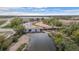 Scenic aerial shot of a river flowing under a bridge with cars, showcasing the surrounding green landscape at 653 S Hoover Ave, Fort Lupton, CO 80621