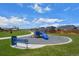 Neighborhood playground offering play equipment, green space, and walking path at 653 S Hoover Ave, Fort Lupton, CO 80621