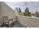Cozy balcony features neutral siding and a scenic view of the neighborhood at 2694 S Xanadu Way # D, Aurora, CO 80014