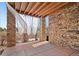Inviting outdoor patio with stone accents and a pergola at 2714 Calmante Pl, Superior, CO 80027