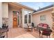 Cozy patio featuring elegant wicker furniture, perfect for relaxing and entertaining guests outdoors at 2714 Calmante Pl, Superior, CO 80027
