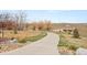 Community walking path with bridge and natural landscaping at 2714 Calmante Pl, Superior, CO 80027