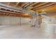 Unfinished basement with exposed ceiling and concrete walls offers potential for customization at 7472 Iridium Way, Castle Rock, CO 80108