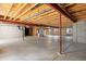 Unfinished basement with exposed ceiling and concrete walls offers potential for customization at 7472 Iridium Way, Castle Rock, CO 80108