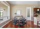 Charming dining room with hardwood floors and a view of the kitchen at 7472 Iridium Way, Castle Rock, CO 80108