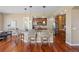 Spacious kitchen featuring an island, bar stool seating, and stainless steel appliances at 7472 Iridium Way, Castle Rock, CO 80108
