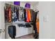 Walk-in closet providing ample storage with shelving and hanging space at 5121 N Yampa St, Denver, CO 80249
