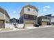 Exterior of home with two-car garage and low-maintenance landscaping at 5121 N Yampa St, Denver, CO 80249
