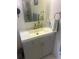 Nicely updated bathroom with a modern vanity, mirror, and brushed nickel fixtures at 8452 Everett Way # C, Arvada, CO 80005
