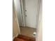 Entryway with tiled floor leading to white doors and wooden steps at 8452 Everett Way # C, Arvada, CO 80005