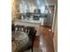 Modern kitchen boasts granite countertops, stainless steel appliances, and white cabinets at 8452 Everett Way # C, Arvada, CO 80005