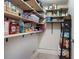 Pantry filled with ample storage space and shelving for organized living at 8452 Everett Way # C, Arvada, CO 80005