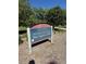 Sign for Arvada Volunteer Fire Fighters Park in a green space at 8452 Everett Way # C, Arvada, CO 80005