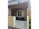 Charming patio with seating under a pergola, perfect for outdoor relaxation at 8452 Everett Way # C, Arvada, CO 80005