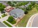 Spacious home with a fenced backyard, lush greenery, and a neatly manicured lawn at 16120 E 119Th Ave, Commerce City, CO 80022