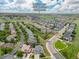 Lovely home aerial view near the Buffalo Run Golf Course Clubhouse in a suburban neighborhood at 16120 E 119Th Ave, Commerce City, CO 80022