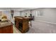 Finished basement with a beautiful bar, chairs and space for entertaining at 16120 E 119Th Ave, Commerce City, CO 80022