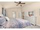 Bright bedroom featuring a vaulted ceiling and ample closet space at 16120 E 119Th Ave, Commerce City, CO 80022