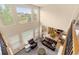 Spacious living room boasts high ceilings and an open floor plan that seamlessly connects to the kitchen and dining area at 16120 E 119Th Ave, Commerce City, CO 80022