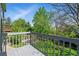 A well-maintained backyard provides a calm view from the upper deck in this suburban Gathering home at 1874 Cedaridge Cir, Superior, CO 80027