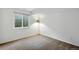 Finished basement with a lamp next to a window at 1874 Cedaridge Cir, Superior, CO 80027