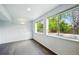 Finished basement illuminated by three windows with a garden view at 1874 Cedaridge Cir, Superior, CO 80027