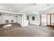 Finished basement area with shelving and a separate room entrance at 1874 Cedaridge Cir, Superior, CO 80027