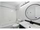 Bathroom features a tub and shower combination and a modern sink and vanity at 1874 Cedaridge Cir, Superior, CO 80027