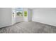 Spacious bedroom featuring a bay window and neutral carpeting at 1874 Cedaridge Cir, Superior, CO 80027