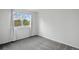 Bright bedroom featuring a large window with neutral walls and carpet at 1874 Cedaridge Cir, Superior, CO 80027
