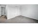 Bedroom with neutral carpet, white walls, and closet with sliding doors at 1874 Cedaridge Cir, Superior, CO 80027