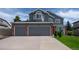 Charming two-story home with a spacious three-car garage and well-maintained landscaping at 1874 Cedaridge Cir, Superior, CO 80027