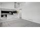 Open-concept layout showcasing the living room and kitchen with modern finishes at 1874 Cedaridge Cir, Superior, CO 80027