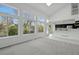 Sun-filled living room featuring soaring ceilings and large windows that provide natural light at 1874 Cedaridge Cir, Superior, CO 80027