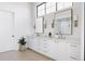 Spacious bathroom with double vanity, modern fixtures, and plenty of storage at 3530 Fenton St, Wheat Ridge, CO 80212