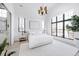 Bright bedroom with ample natural light, white walls, and contemporary decor at 3530 Fenton St, Wheat Ridge, CO 80212