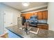 Well-lit kitchen with stainless steel appliances and center island for prepping meals at 1771 W 53Rd Pl # 2, Denver, CO 80221