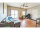Inviting living room with hardwood floors and a comfortable gray sofa at 1771 W 53Rd Pl # 2, Denver, CO 80221